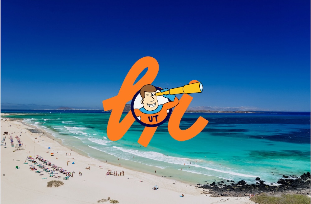 Sunny beach with vacationers